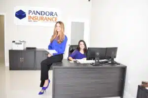 Pandora Insurance team at the front desk of founding location